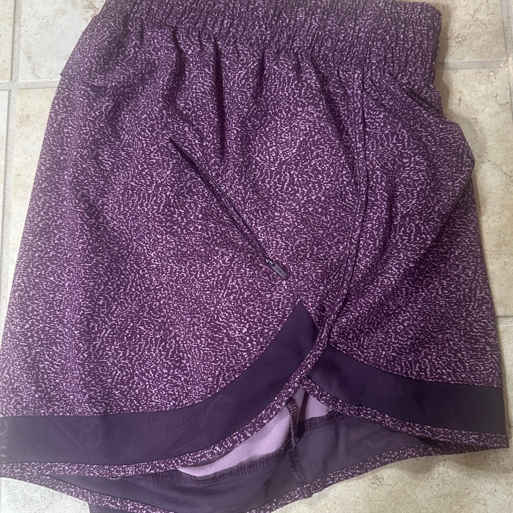 Athleta purple Mesh Racer short with Zipper Pocket